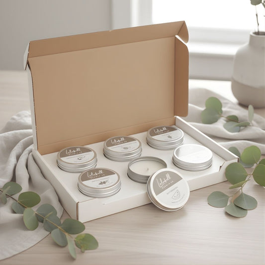 Set of six candles in a candle sampler box